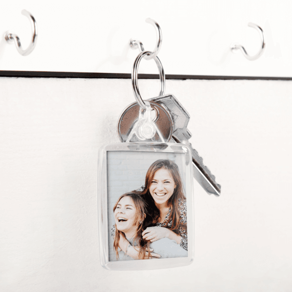 Bestel Sleutelhanger set met foto - 100 stuks (dubbelzijdig) met eigen foto